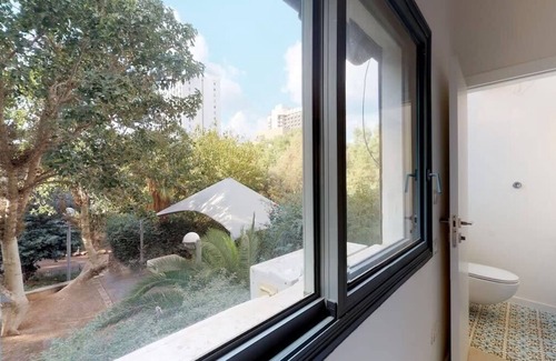 Tel Aviv Promenade Apartment | Limoncello at Hakerem by HolyGuest