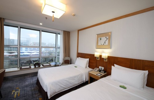 Sanyuanli Hotel | Liuhua Hotel