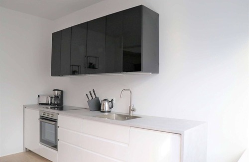 Downtown Apartment | Located in downtown Reykjavik, on the corner of Laugavegur and Skólavörðustígur.