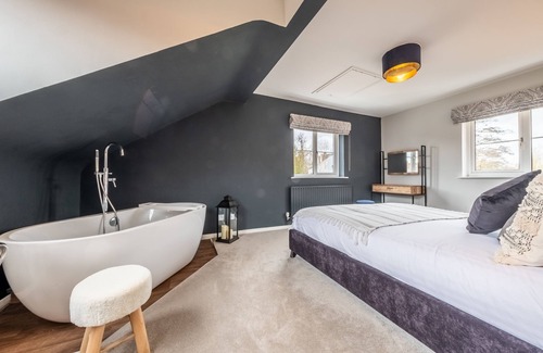 Saxthorpe Cottage | Located quietly and tucked away in the village of Saxthorpe, Inglenook, a semi-detached cottage dati