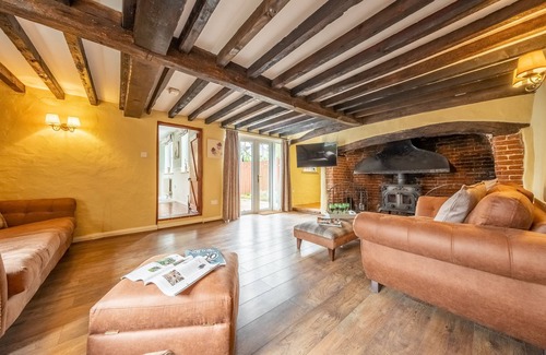 Saxthorpe Cottage | Located quietly and tucked away in the village of Saxthorpe, Inglenook, a semi-detached cottage dati