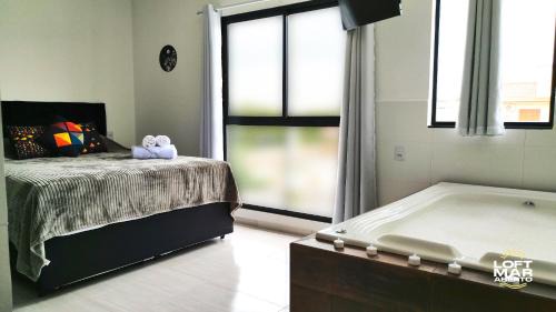 Palhoca Apartment | Loft na praia com Banheira