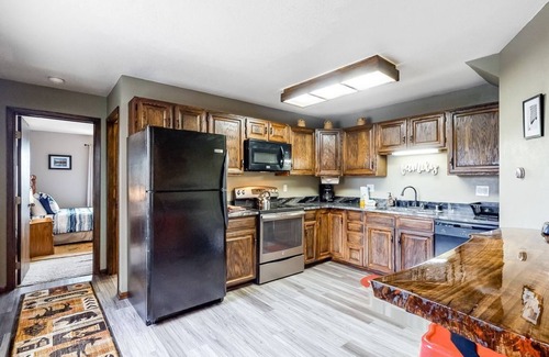 Wildernest Condo | Lofty condo with beautiful mountain & lake views plus wood fireplace