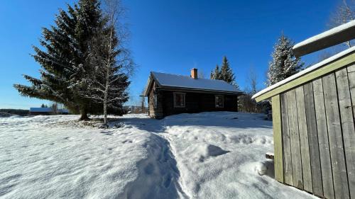 Hassela House | Log Cabin from 1820s with wood-heated sauna
