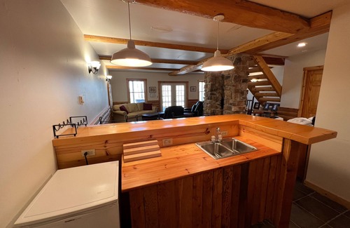 McHenry House | Log cabin in forested setting with private hot tub & amazing views, dog-friendly