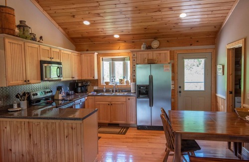 West Jefferson Cabin | Log Cabin in West Jefferson - Fishing Pong + Hot Tub + Fire Pit + Mountain Views