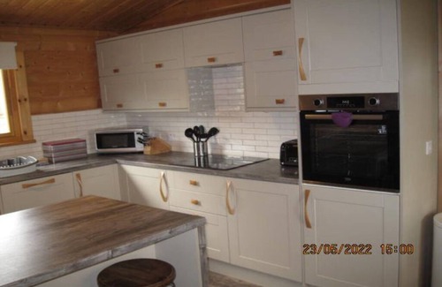 Kenwick Cabin | Log cabin with decked veranda, nestled in Kenwick Park, Louth