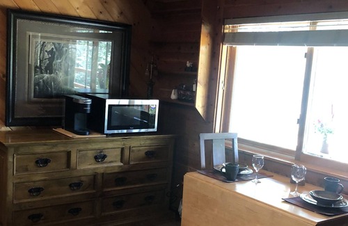 Bigfork Apartment | Log home studio in the woods. Pet friendly.
