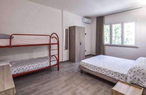 Santa Maria del Mare Torrazzo Apartment | Look forward to a beautiful view of the sea in this beachfront vacation rental.