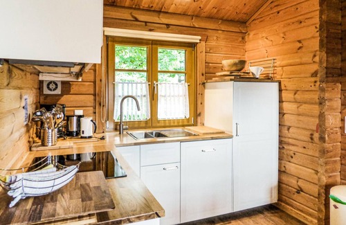 Hayingen House | Look forward to a relaxing vacation in the wooden house in the Lauterdörfle vacation park in the Swa