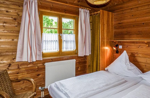 Hayingen House | Look forward to a relaxing vacation in the wooden house in the Lauterdörfle vacation park in the Swa