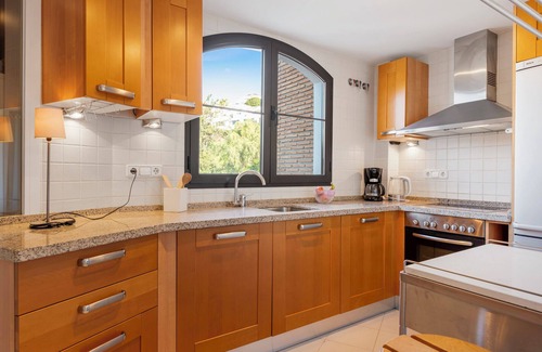 Benahavis Apartment | Los Arqueros sunny balcony with pool by Costarentals - Ref M52