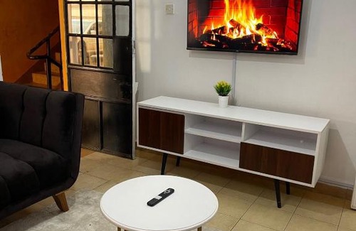 Ruaka Apartment | Lovely 1 bedroom with parking on premise.