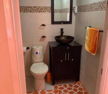 Gibbons Apartment | Lovely 2 bedroom condo with WiFi in a quiet area, 7-10 minutes away from both the airport and Oistins