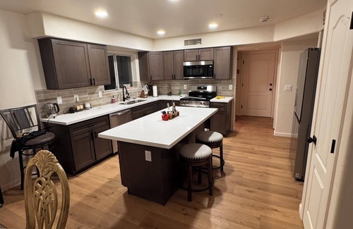 Metropolitan House | Lovely 3-bedroom house with pool, 3 car garage, spacious, work station.