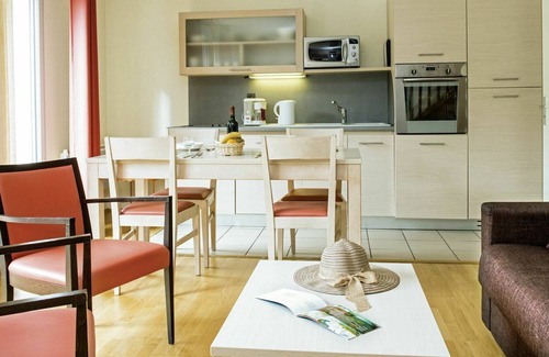 Divonne-les-Bains Apartment | Lovely apartment for 6 guests with WIFI, hot tub, pool, A/C, TV, terrace, pets allowed and parking