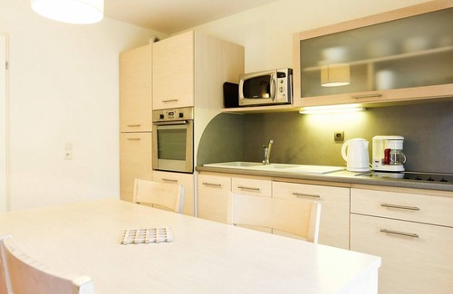 Divonne-les-Bains Apartment | Lovely apartment for 6 guests with WIFI, hot tub, pool, A/C, TV, terrace, pets allowed and parking