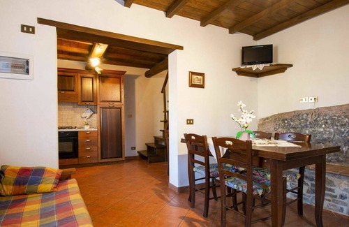 Fabbriche di Vallico Villa | Lovely apartment in villa for 12 people with private pool, WIFI, TV, patio and pets allowed
