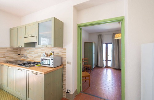 Montebonello Apartment | Lovely apartment for 4 people with WIFI, pool, A/C, TV, pets allowed and panoramic view