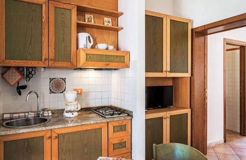 San Feliciano Apartment | Lovely apartment for 4 guests with A/C, WIFI, pool, TV, patio and pets allowed