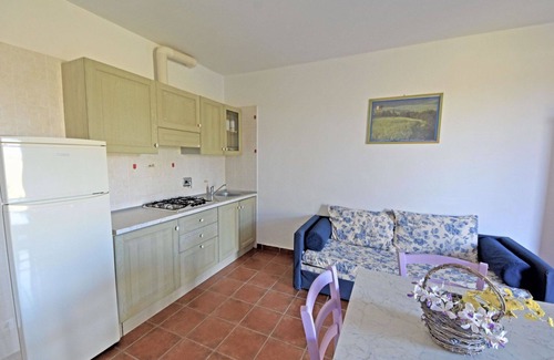 Follonica Apartment | Lovely apartment for 6 guests with pool, A/C, TV, patio and pets allowed