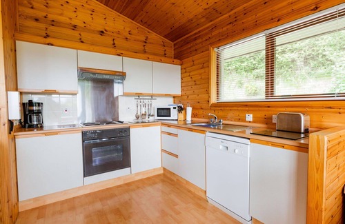 Drumnadrochit House | Lovely apartment in villa for 6 guests with WIFI, TV, patio and panoramic view