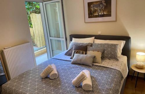 Marousi Apartment | Lovely Apartment with Garden and indoor Fireplace!
