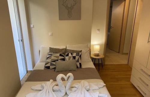 Marousi Apartment | Lovely Apartment with Garden and indoor Fireplace!
