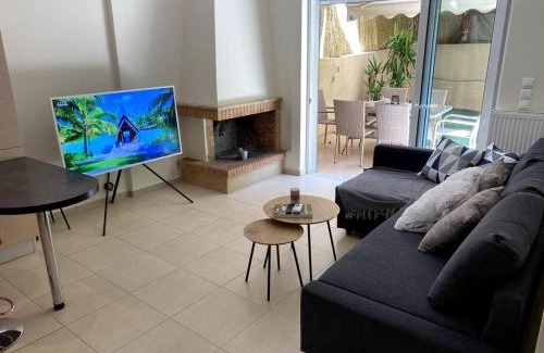 Marousi Apartment | Lovely Apartment with Garden and indoor Fireplace!