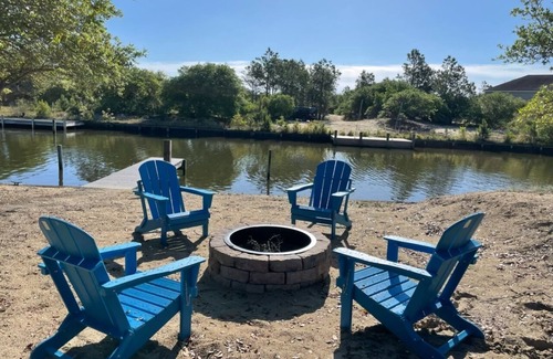 Carova Beach House | Lovely Canal Front Home in the 4X4! Reasonable Rates!