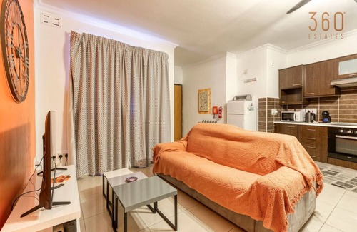 Tal-Ghoqod Apartment | Lovely, central 2BR home, just off St Julians w/AC