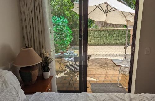 Perth Central Business District Apartment | Lovely city apartment with private courtyard, pool, free parking, gym
