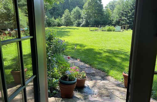 Rye Valley House | Lovely cottage by stream with caboose and covered bridge over trout stream