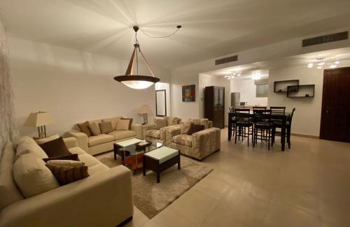 Aqaba Apartment | Lovely first floor tow bed rooms overviewing circular pool for families only in Talabay Aqaba