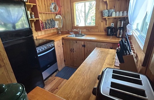 Wasaga Beach Cottage | Lovely Water Front Cottage- pool,firepit and amenities near by & access to water