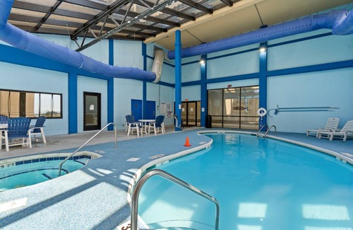 Windy Hill Apartment | Low Tide | Oceanfront Balcony | Kitchen | Pools