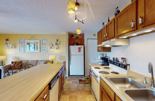 Village of Four Seasons Condo | Lower level lakefront condo