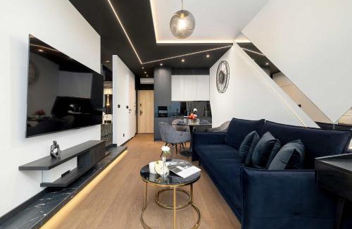 Katowice Apartment | Luksusowe, Klimatyzowane Studio w Centrum Katowic z Pięknym Widokiem na Miasto, Wanną z Hydromasażem, Biurkiem i Parkingiem by Renters Prestige