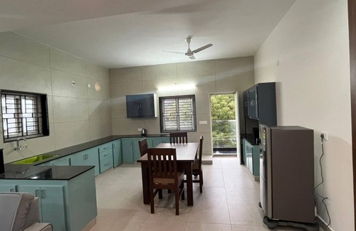 Tirupati Apartment | Luxe 2 BHK Flat with a vast living room, wifi and Air conditioning in Tirupati.