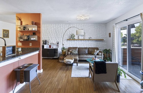 St. Johns Condo | Luxe 2BR Retreat with Home Theater Espresso and Parking