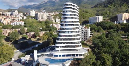 Becici Apartment | Luxe Beachfront Stay in Bečići with Pool