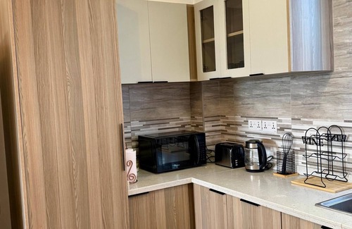 Nairobi Apartment | Luxurious 2BR Retreat with King Bed, Stunning Views, Pool, Gym & Self Check-In