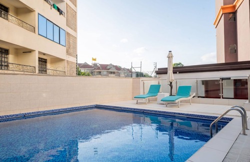 Nairobi Apartment | Luxurious 2BR Retreat with King Bed, Stunning Views, Pool, Gym & Self Check-In