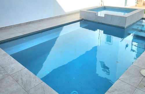 Santurce Villa | Luxurious 7-bedroom Villa with Pool: ADA-Friendly and just Steps to the Beach