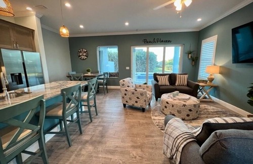 Ocean Shores House | Luxurious 8 king bedroom, 10 bath Melbourne, FL retreat across from a private 40-mile sandy beach