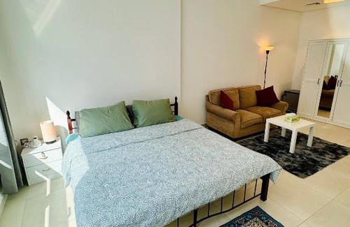 Al Muraqqabat House | Luxurious Room with Dedicated Bathroom Near Rigga Metro with all Modern Facilities