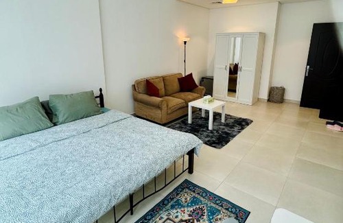 Al Muraqqabat House | Luxurious Room with Dedicated Bathroom Near Rigga Metro with all Modern Facilities