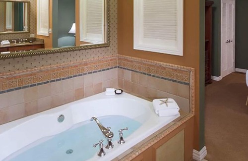 Key West Resort | Luxurious top floor, end unit, within premier resort on the Atlantic Ocean.