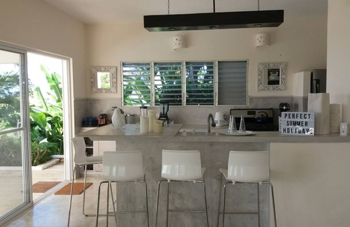 Rio San Juan Villa | Luxurious villa set in a vast tropical garden, with panoramic sea and nature views.