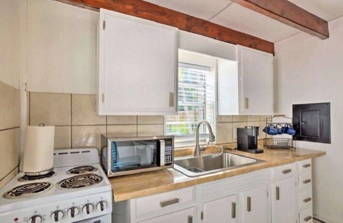 Leisureville Cottage | Luxury 1 Bedroom Cottage with Resort Style Heated Pool In Tropical Paradise!